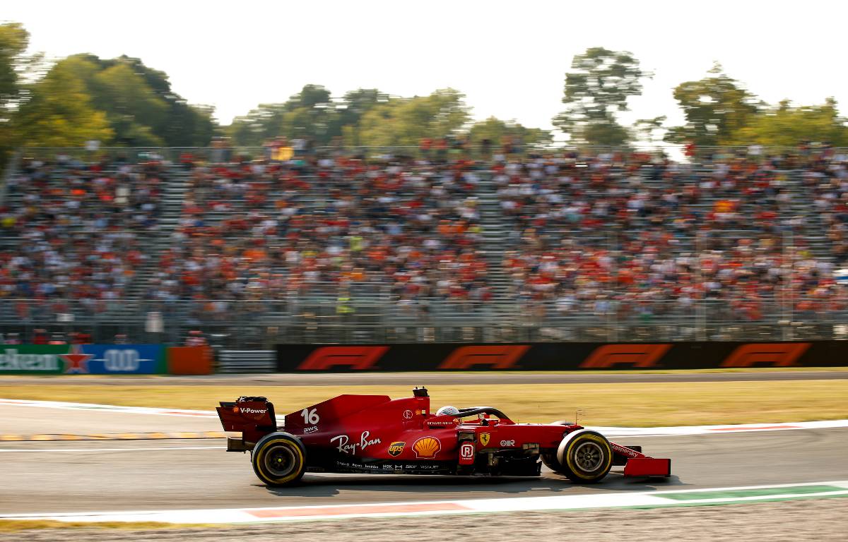 Charles Leclerc's Ferrari passes a grandstand at the Italian GP. Monza September 2021.