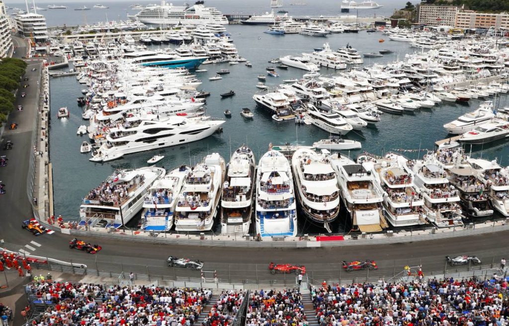 Cars pass the harbour during the Monaco GP. Monte Carlo May 2019.