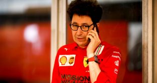 Mattia Binotto mid-telephone call at the Qatar GP. Lusail November 2021.