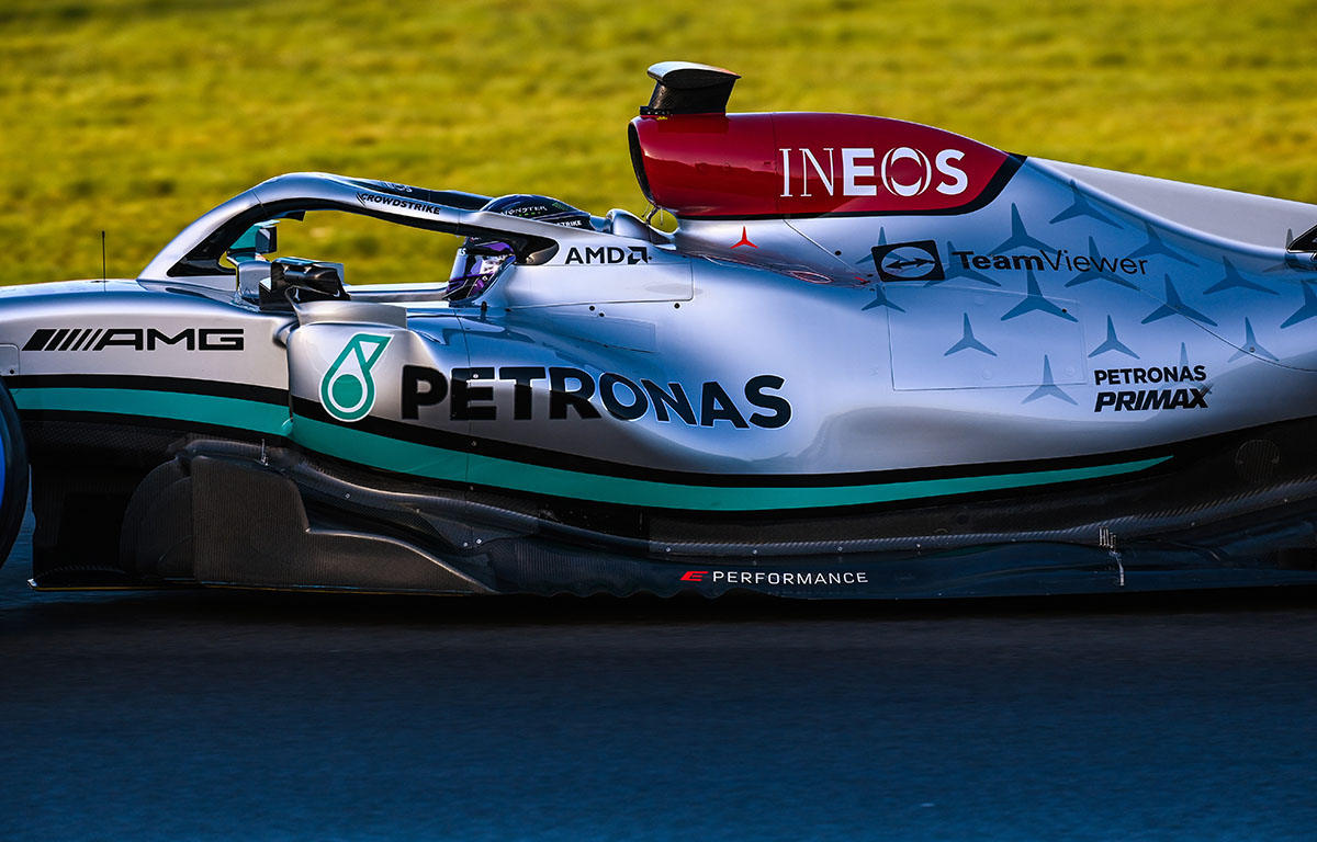 Side-on view of Lewis Hamilton during the Mercedes W13 shakedown. Silverstone February 2022.