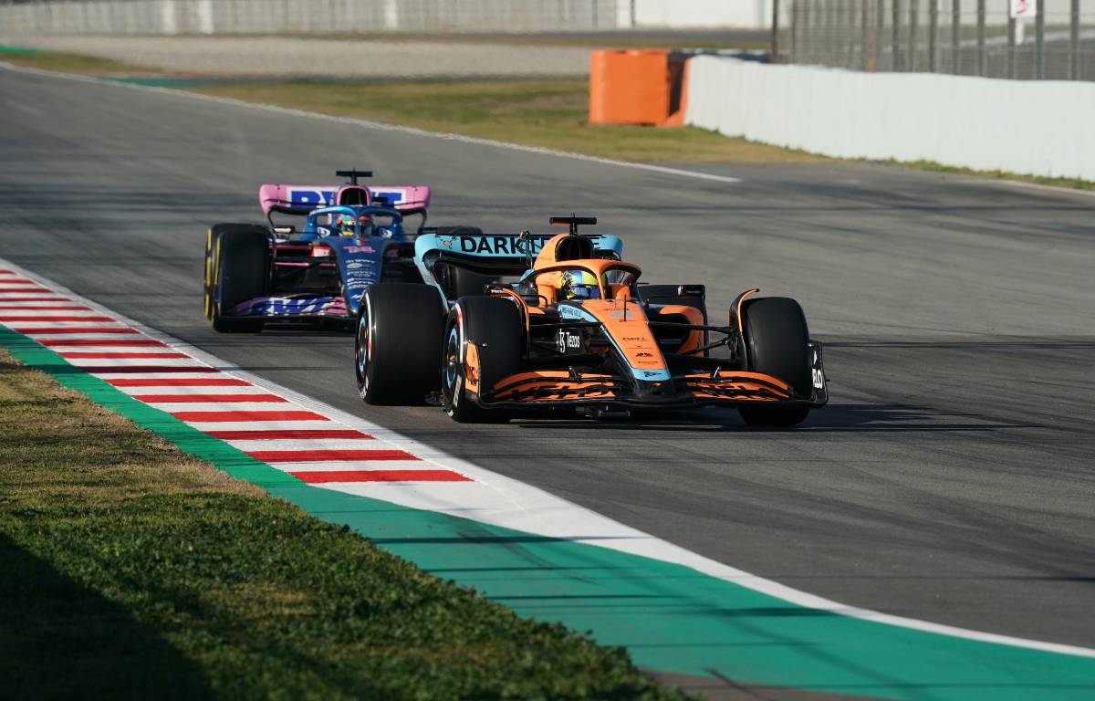 Fernando Alonso, Alpine, follows Lando Norris, McLaren. Spain, February 2022.