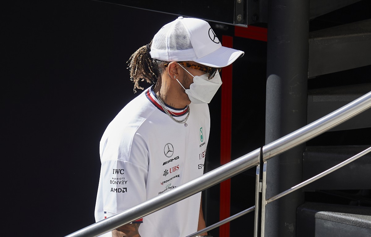 Lewis Hamilton, Mercedes, climbs the stairs. Spain, February 2022.