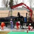 Fernando Alonso's Alpine loaded onto a trailer after breaking down. Barcelona February 2022.