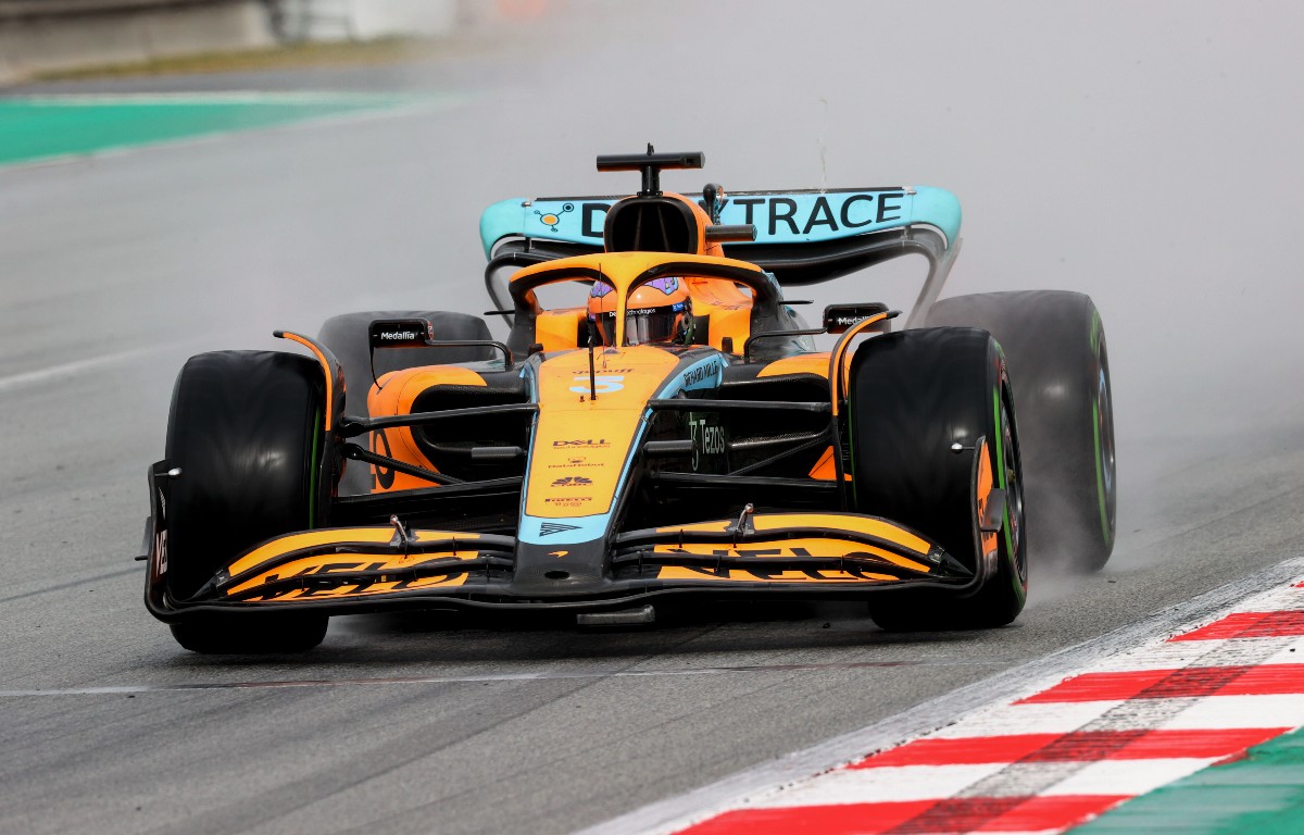 Spray created by Daniel Ricciardo's McLaren. Spain, February 2022.