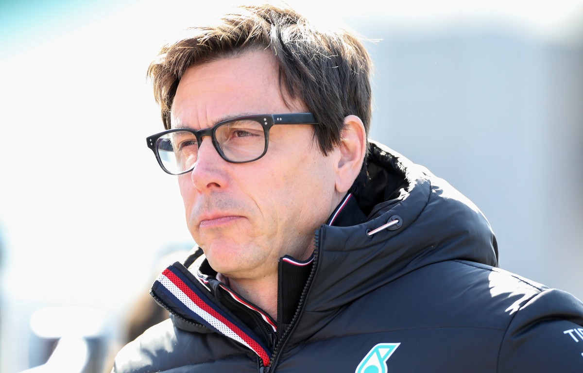 Mercedes' Toto Wolff wearing glasses.