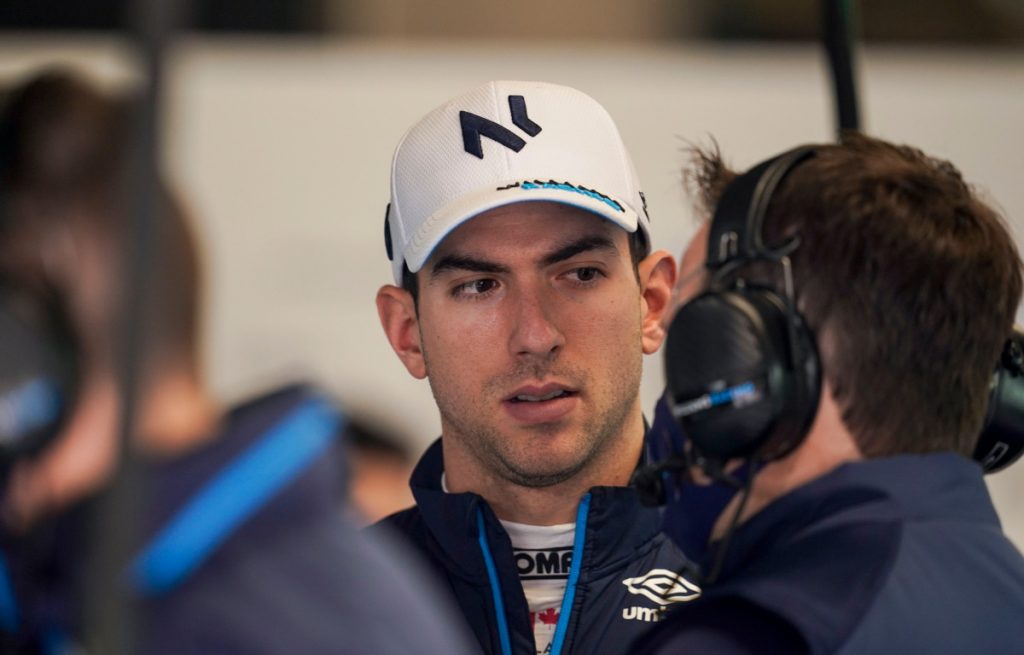 Nicholas Latifi in the Williams garage speaking with engineer. Barcelona February 2022