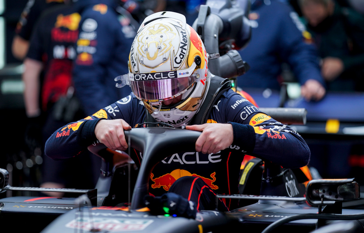 Max Verstappen climbs into his Red Bull RB18 in testing. Barcelona February 2022