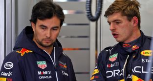 Max Verstappen explains to Sergio Perez in testing. Barcelona February 2022