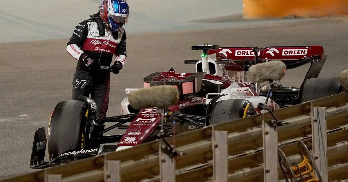 Valtteri Bottas looks at his stricken Alfa Romeo. Bahrain March 2022.