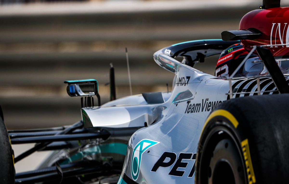 George Russell from behind Mercedes W13 mirror in testing. Bahrain March 2022