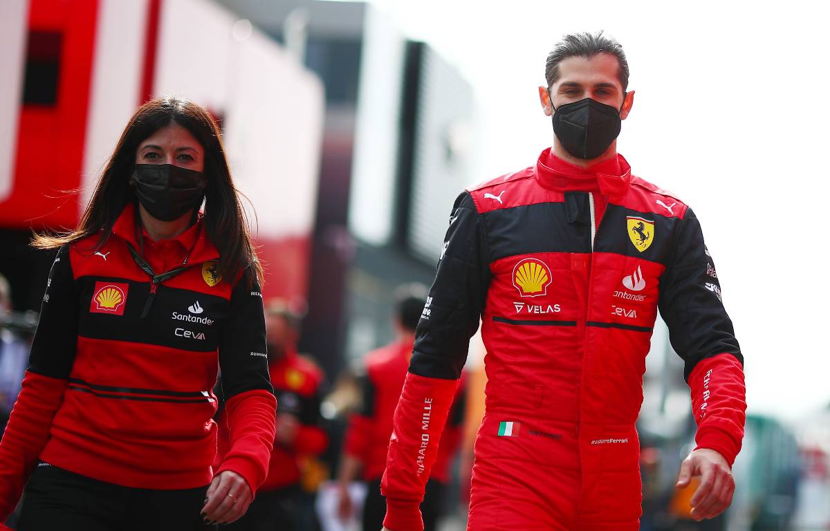 Antonio Giovinazzi walking in Ferrari fireproofs. Barcelona February 2022.
