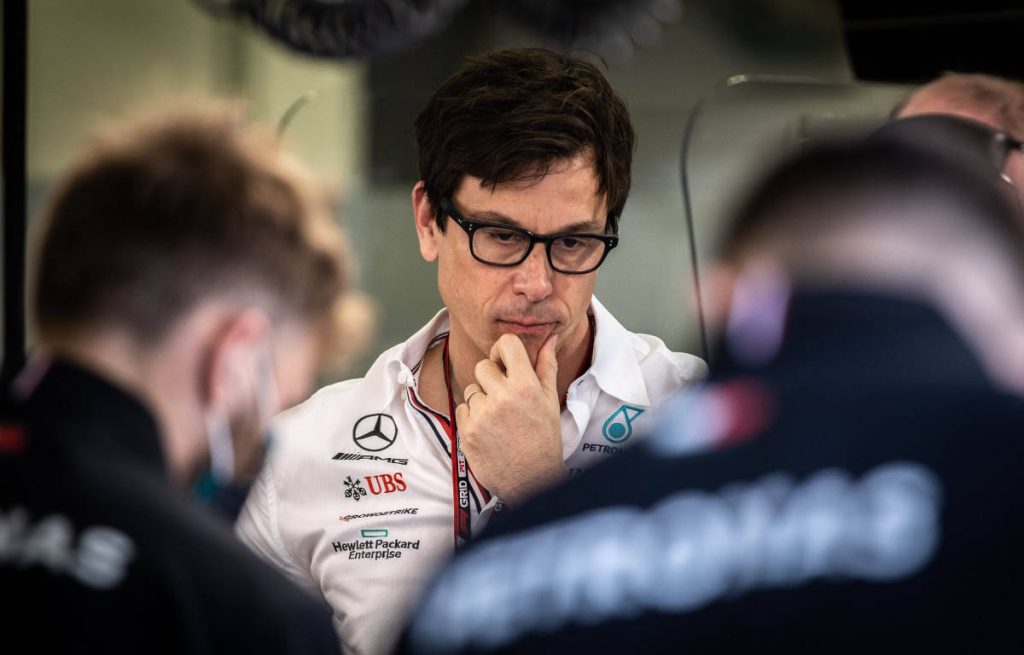 Mercedes team boss Toto Wolff inspects team data. Bahrain March 2022.