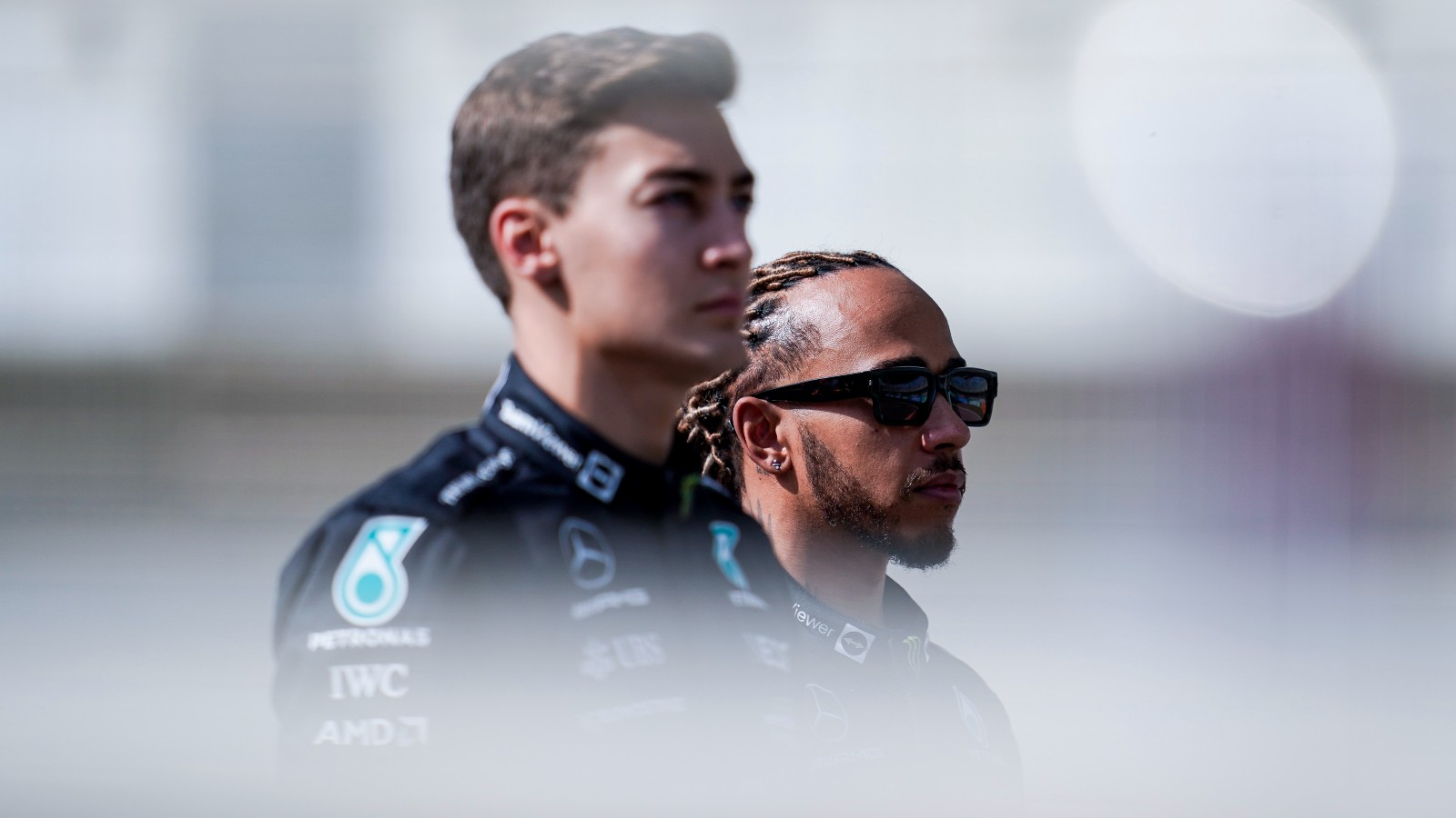 Mercedes' George Russell and Lewis Hamilton look forward. Bahrain, March 2022.