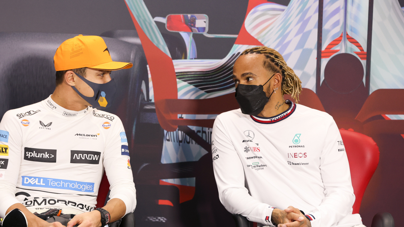 Lando Norris and Lewis Hamilton at a pre season press conference. Bahrain March 2022