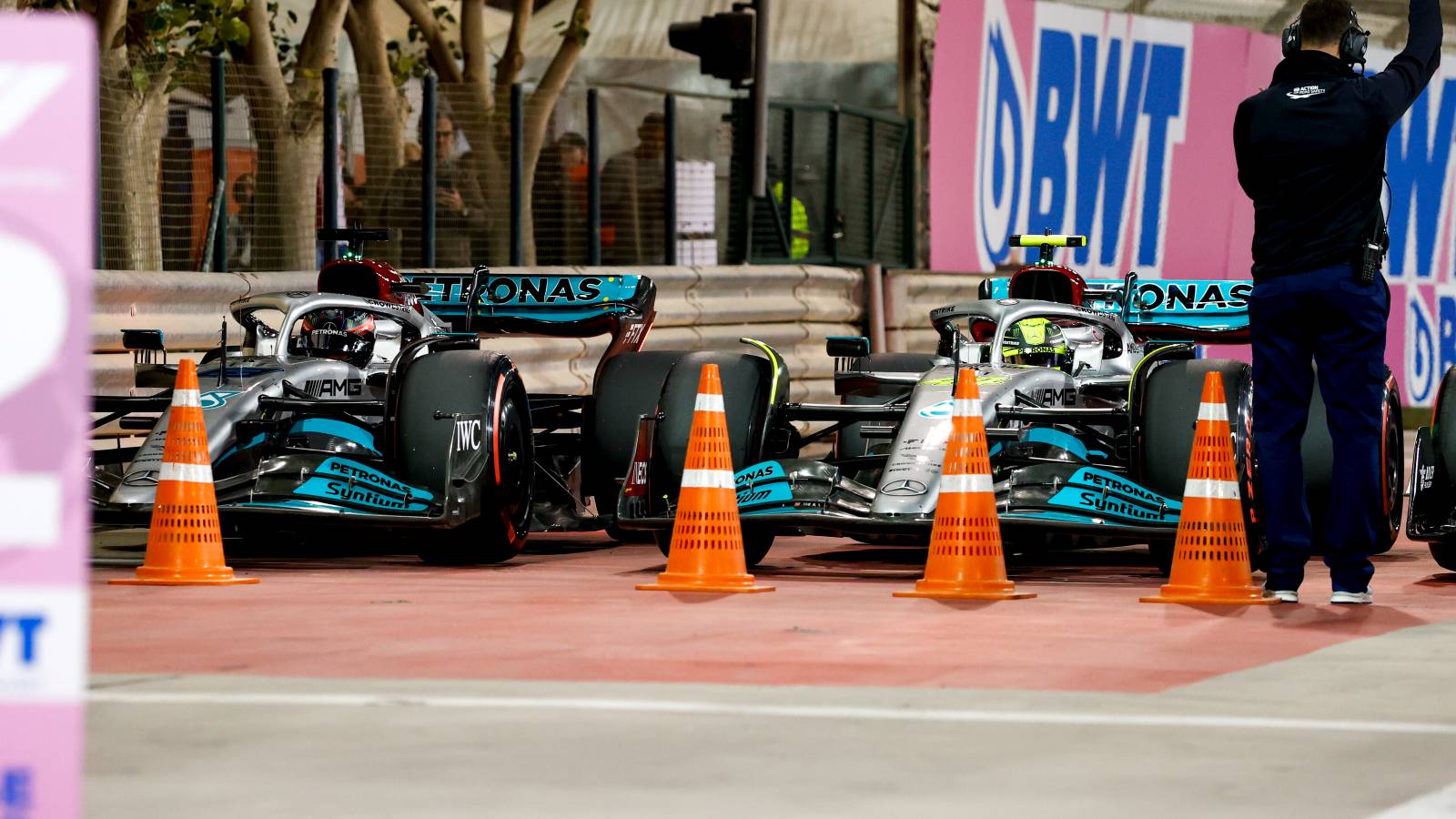 George Russell and Lewis Hamilton, Mercedes, park up in the paddock.  Bahrain, March 2022.