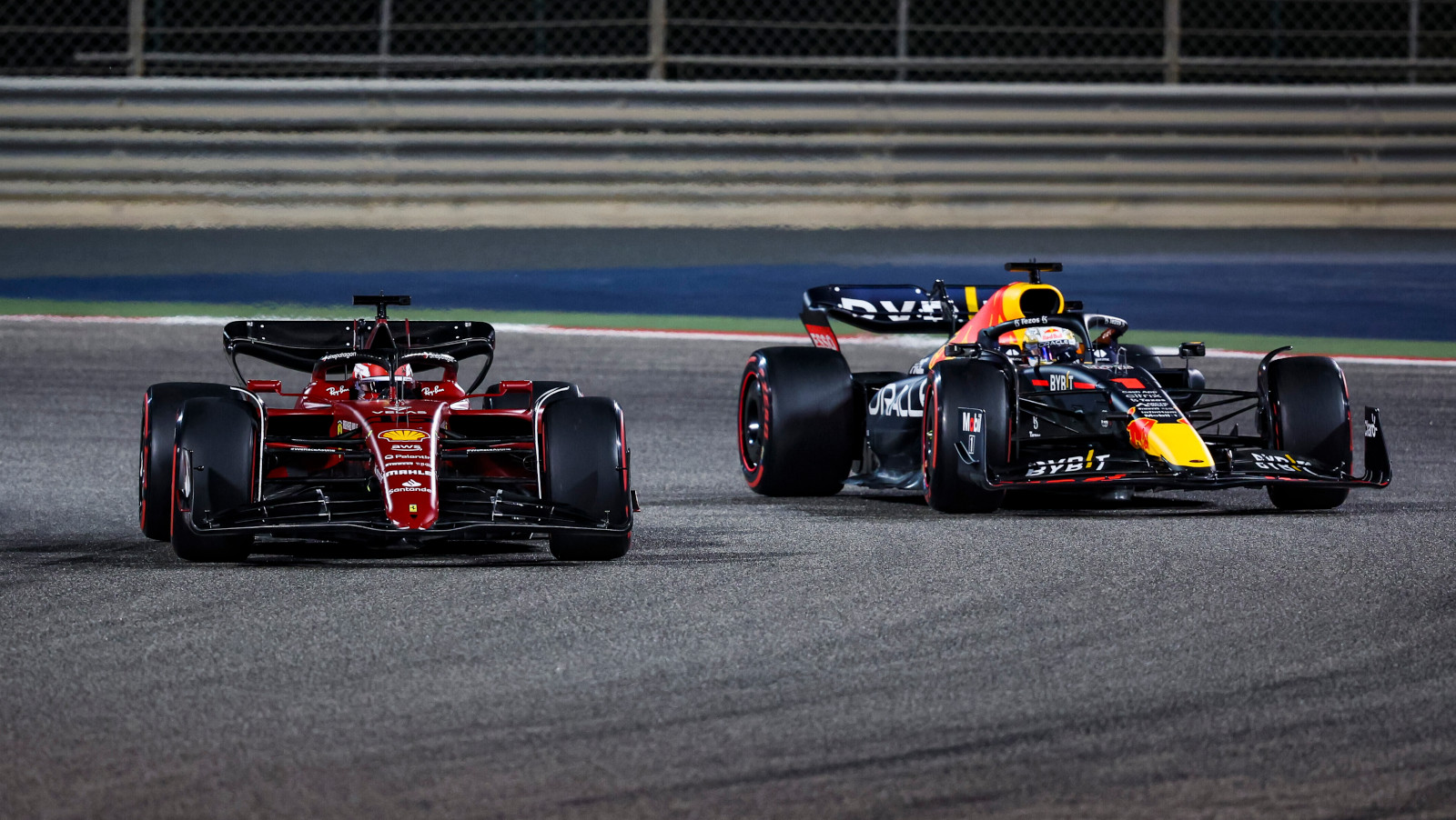 Max Verstappen racing Charles Leclerc. Bahrain March 2022