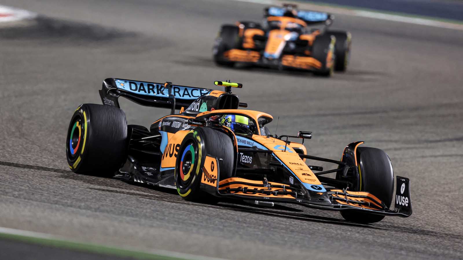 Lando Norris leading the second McLaren of Daniel Ricciardo at the season-opening Bahrain Grand Prix. A tough start which saw them finish 14th and 15th.