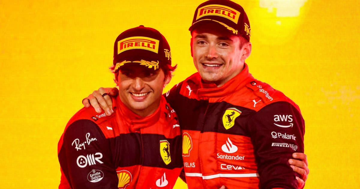 Charles Leclerc and Carlos Sainz hug on Bahrain podium. Bahrain 2022