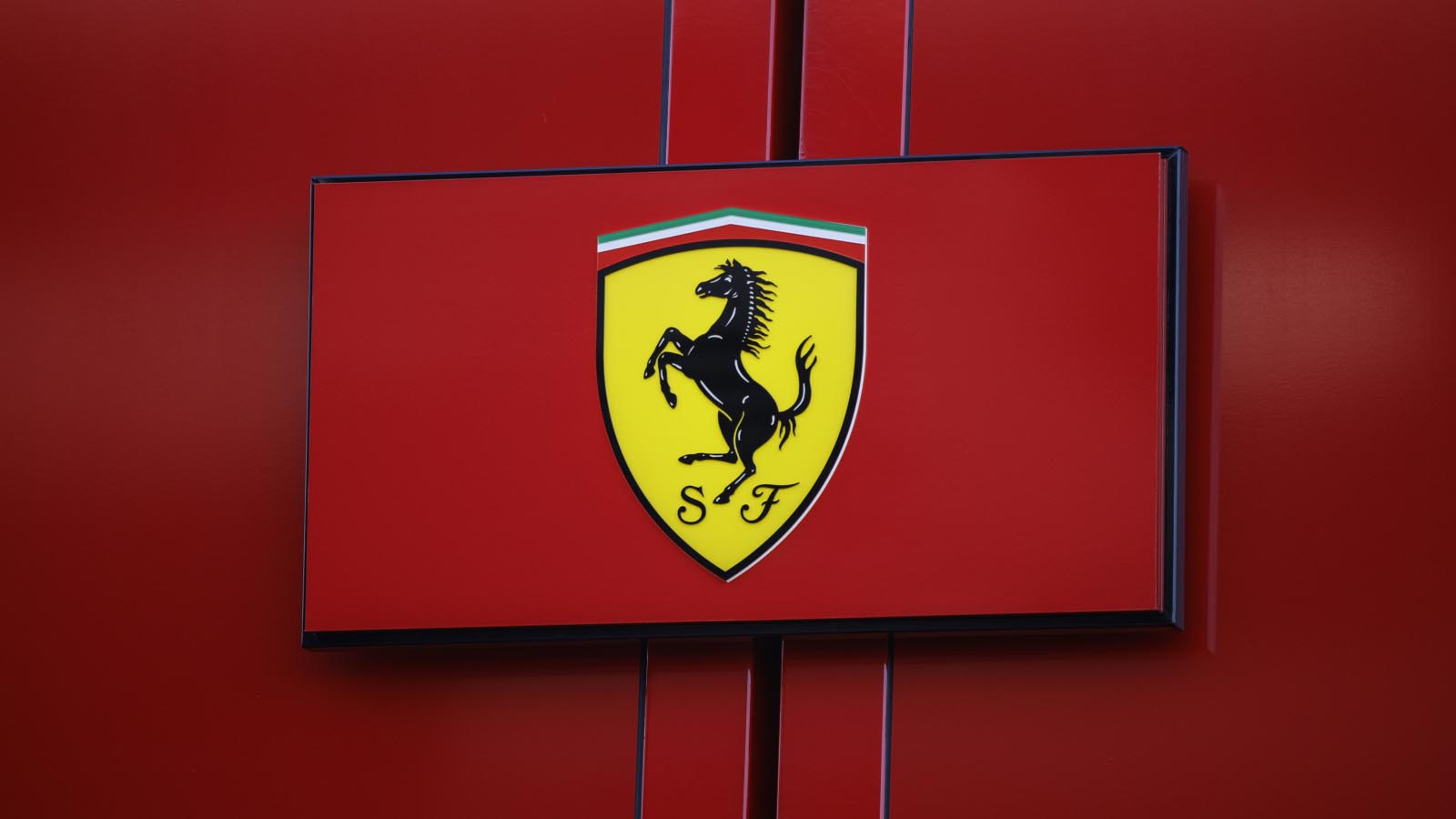 F1 Rumours Ferrari Making Good Gains In Weight Loss Battle With 2023   Ferrari Logo On Garage Barcelona Test 2022 Planetf1 