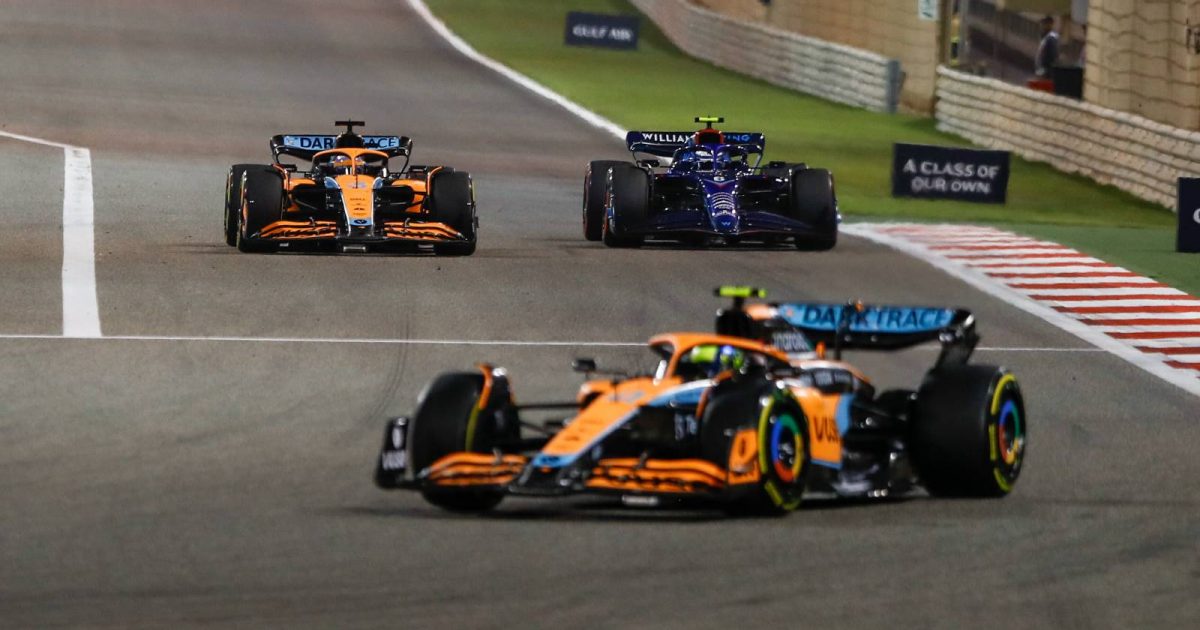 Daniel Ricciardo, McLaren, passes Nicholas Latifi, Williams. Bahrain, March 2022.