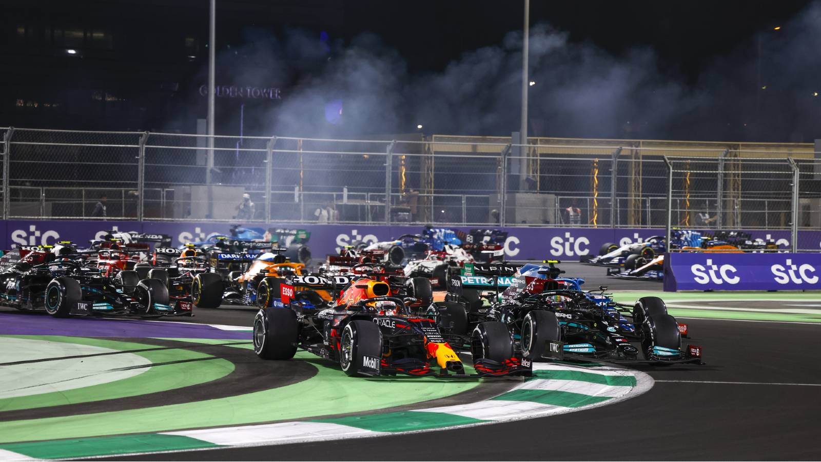 Max Verstappen's Red Bull cuts across the kerb. Jeddah December 2021.