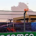 F1 show goes on after nearby missile attack on oil factory