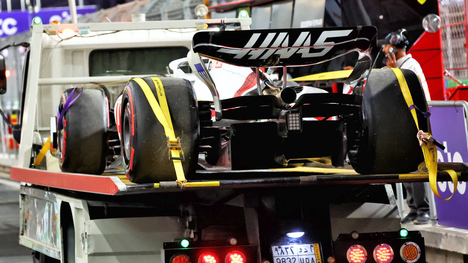 Kevin Magnussen's broken Haas towed to pits. Saudi Arabia March 2022.