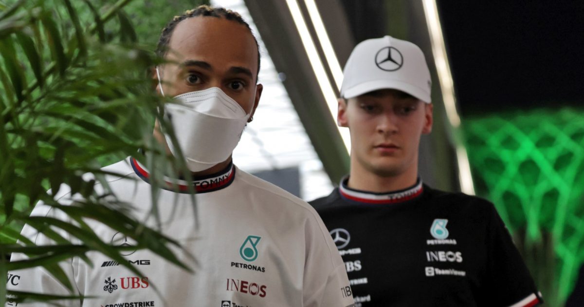 Mercedes' Lewis Hamilton and George Russell walk together. Saudi Arabia March 2022.
