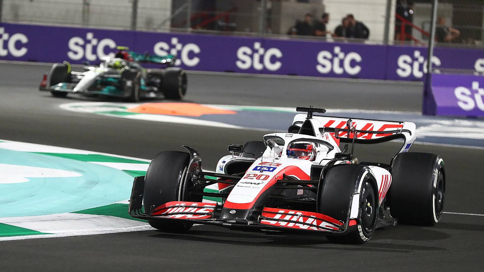 Lewis Hamilton, Mercedes, follows Kevin Magnussen, Haas. Saudi Arabia March 2022.
