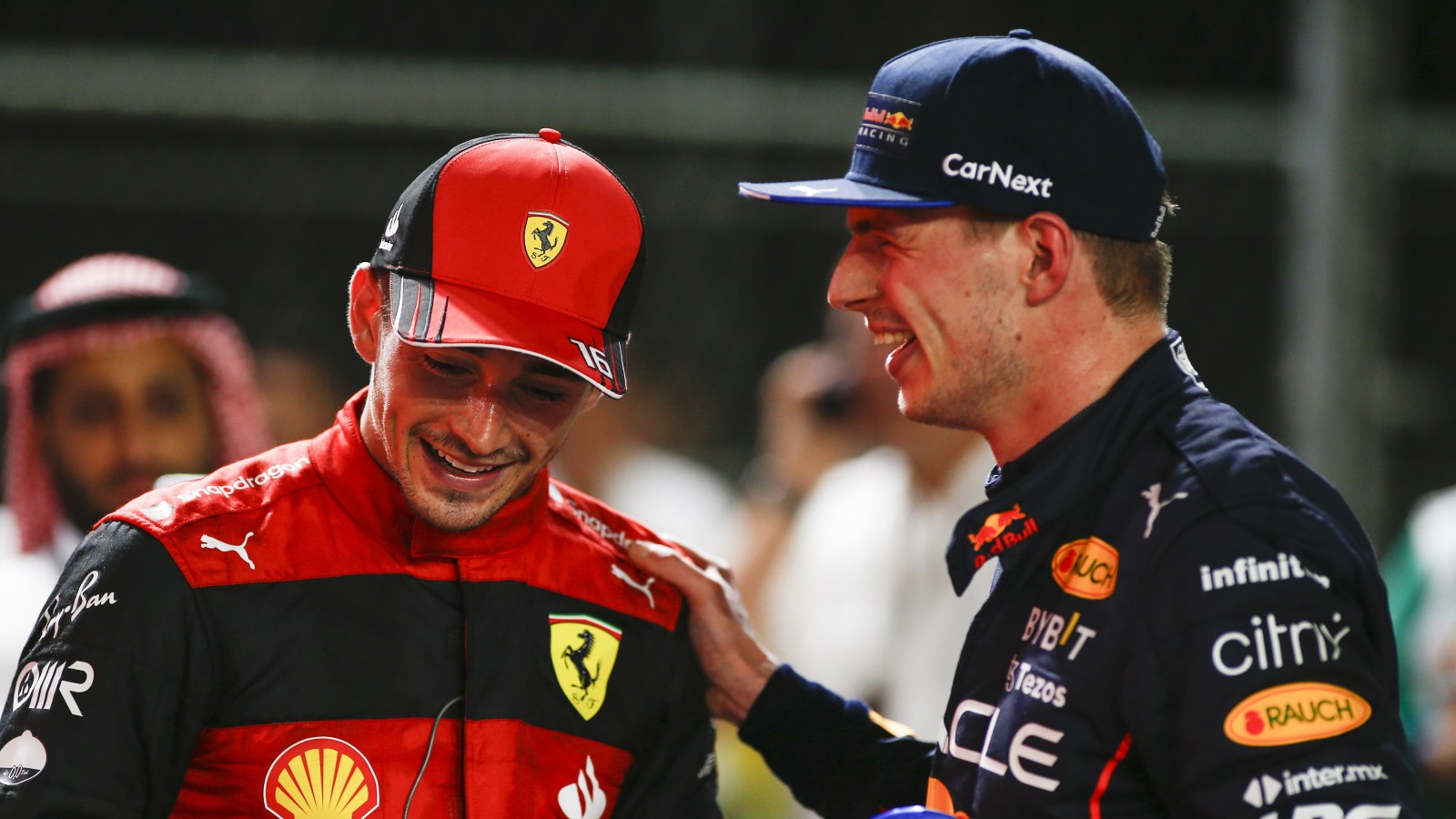 Charles Leclerc laughs with Max Verstappen after the Saudi Arabian Grand Prix. Saudi Arabia, March 2022.