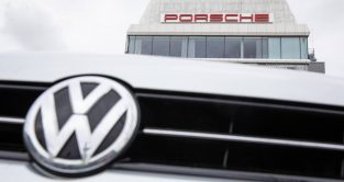 Volkswagen and Porsche logos on display. Stuttgart February 2022.