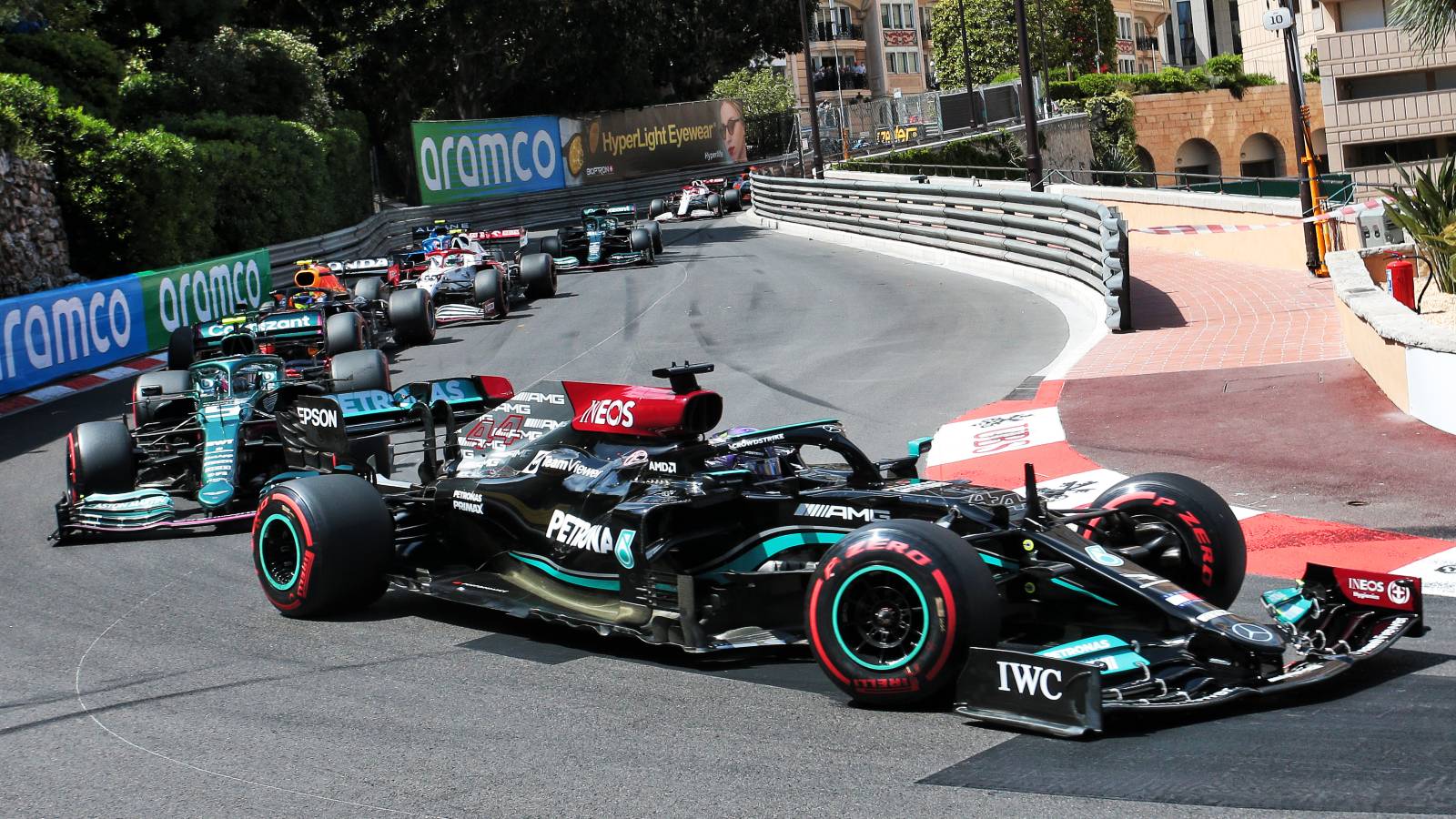 Lewis Hamilton, Mercedes, leads a train of cars. Monaco, May 2021.