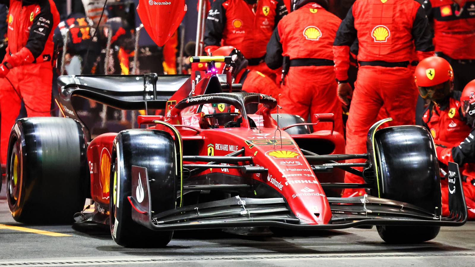 Carlos Sainz drives out of the Ferrari pit box. Saudi Arabia, March 2022.