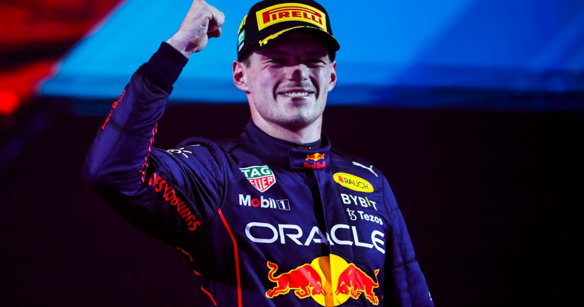 Max Verstappen, Red Bull, celebrates with his arm raised. Saudi Arabia, March 2022.