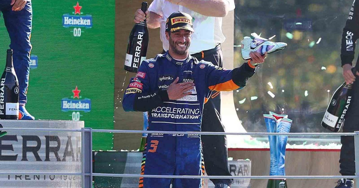 Daniel Ricciardo lines up a shoey. Monza September 2021.