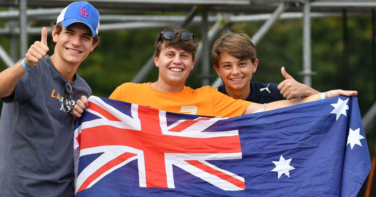 Fans pose with the Australia flag before practice at Monza. September 2021