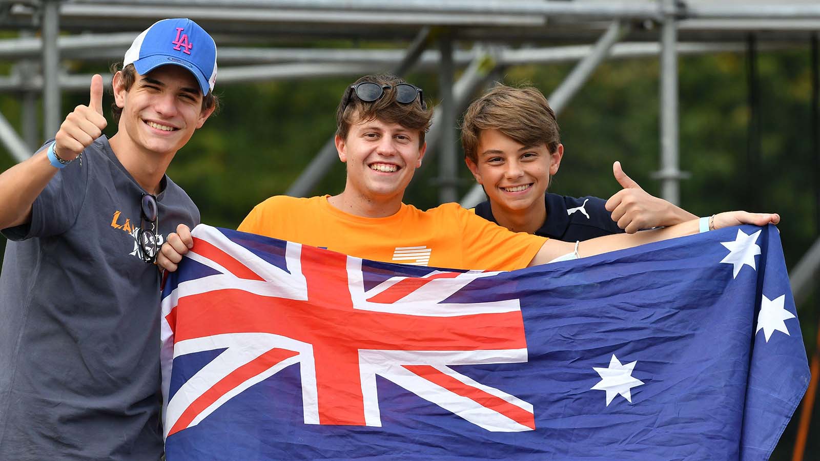 Fans pose with the Australia flag before practice at Monza. September 2021