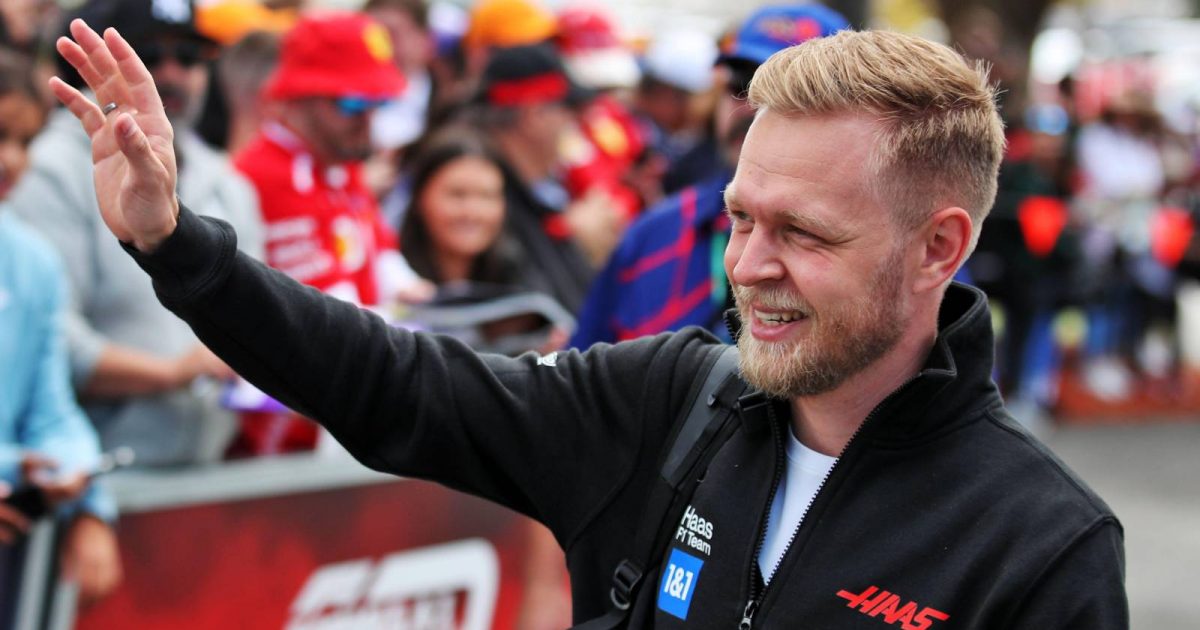 Kevin Magnussen waves to fans at the Australian GP. Melbourne April 2022.