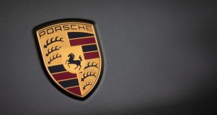 The Porsche logo is seen on a car at the company's headquarters. Germany February 2022