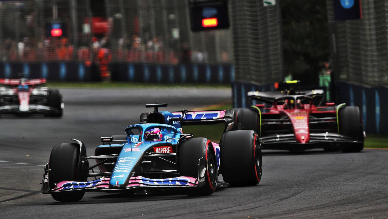 Fernando Alonso ahead of a Ferrari at the Australian GP. Melbourne April 2022.