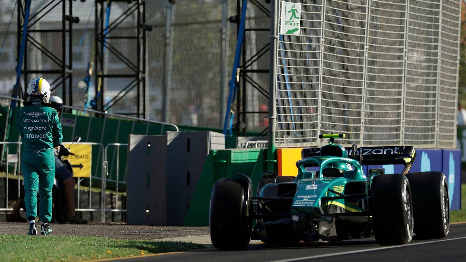 Sebastian Vettel walks away from crashed Aston Martin. Melbourne April 2022.