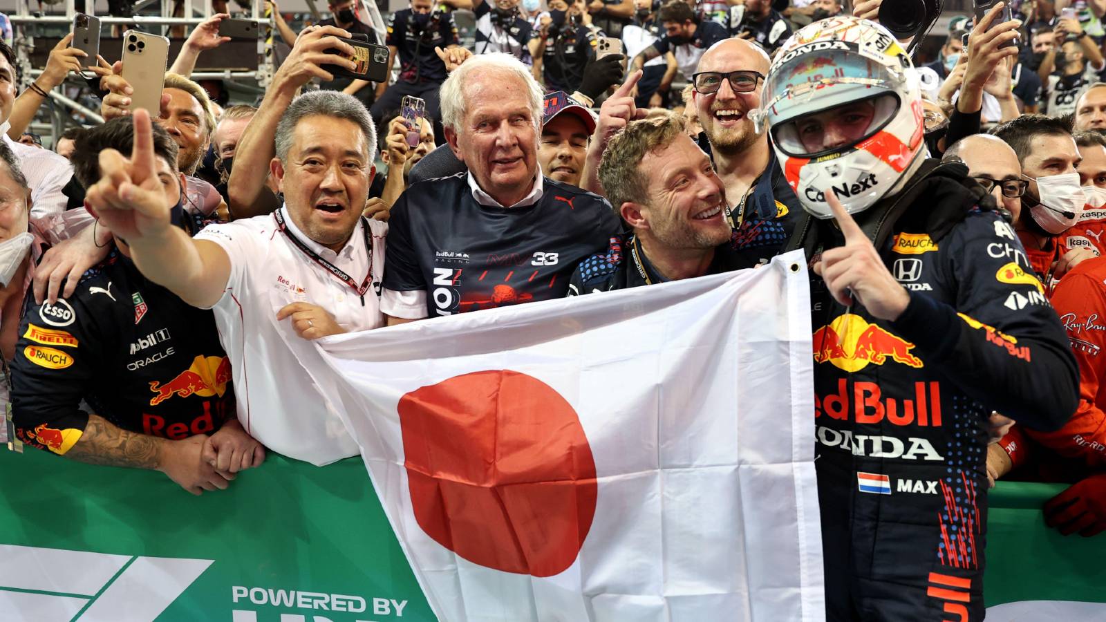 Red Bull and Honda personnel celebrate winning the World Championship. Abu Dhabi December 2021.