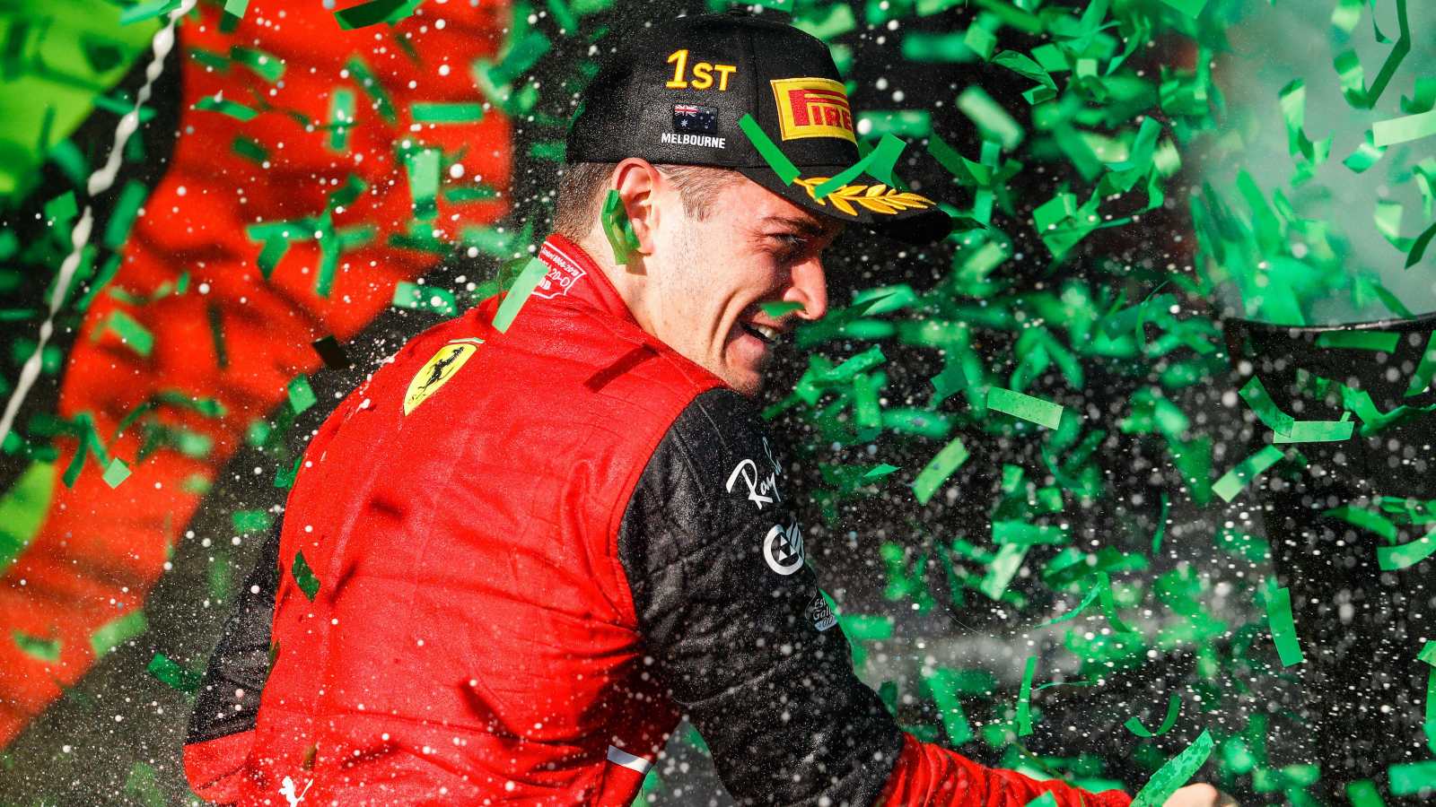 Charles Leclerc sprays champagne on the podium. Melbourne, April 2022.