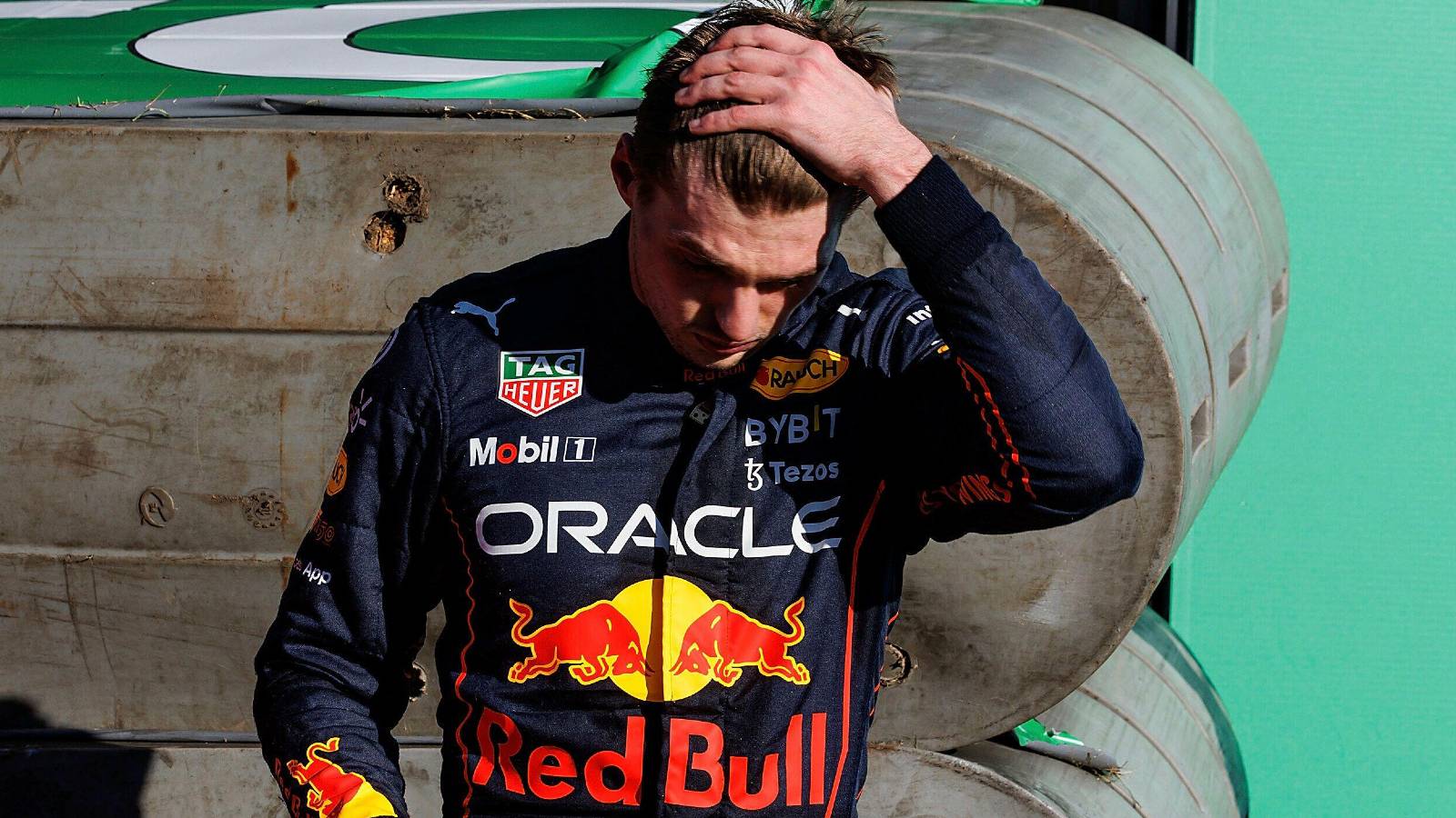 Max Verstappen, Red Bull, looks to the ground. Australia, April 2022.