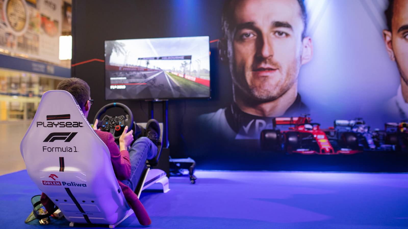 A player tries the F1 video game. Poznan October 2019.