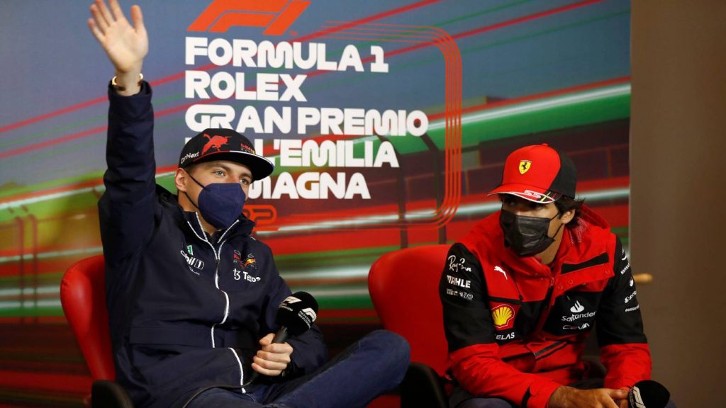 Max Verstappen waving next to Carlos Sainz. Imola April 2022.