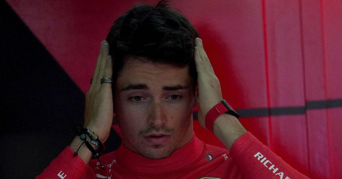 Charles Leclerc with his hands on the side of his head. Imola April 2022.