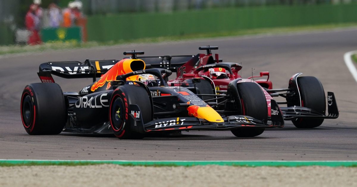 Max Verstappen, Red Bull, overtakes Charles Leclerc, Ferrari. Italy, April 2022.