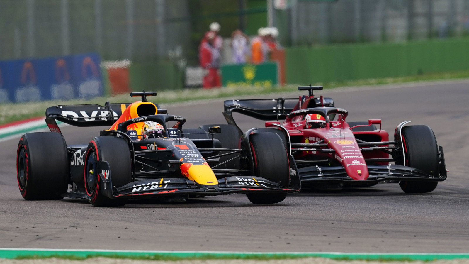 Red Bull man Max Verstappen racing Charles Leclerc. Imola April 2022