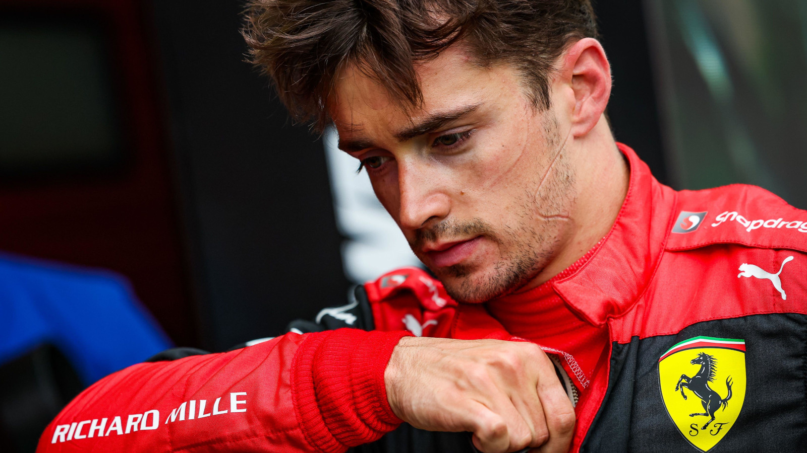 Charles Leclerc head down disappointed. Imola April 2022